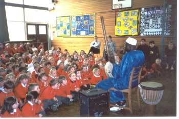 Seikou Susso storytelling in a school in West Yorkshire, UK